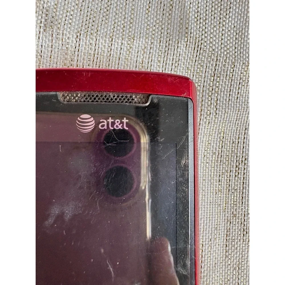 red Samsung SGH-A777, a 3G slider phone